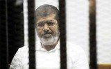 Mohamed Morsi trial adjourned as chaos breaks in the Egyptian court